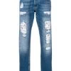 Alexander McQueen distressed folk embroidery jeans