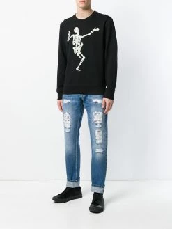 Alexander McQueen distressed folk embroidery jeans