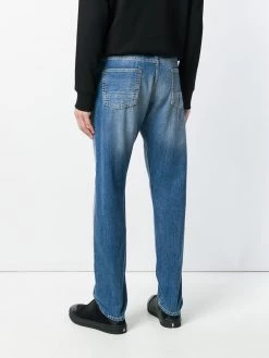 Alexander McQueen distressed folk embroidery jeans