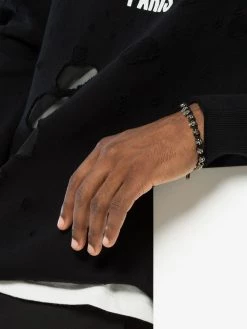Alexander McQueen black and silver metallic skulls drawstring bracelet