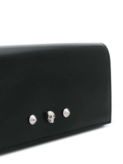 Alexander McQueen studded skull clutch