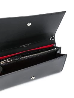 Alexander McQueen studded skull clutch