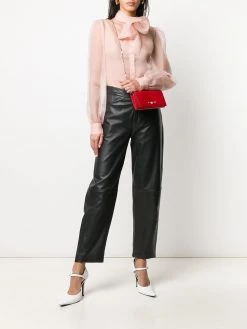 Alexander McQueen skull and stud bag