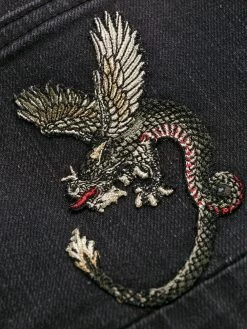 Alexander McQueen dragon patch slim-fit jeans