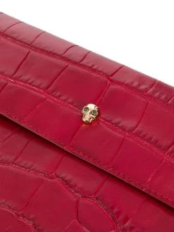 Alexander McQueen crocodile-effect skull clutch bag