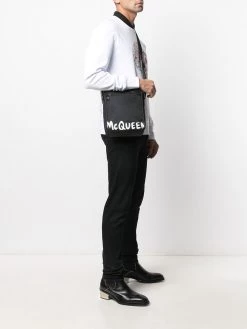 Alexander McQueen painted logo messenger bag