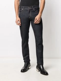 Alexander McQueen studded logo slim-fit jeans