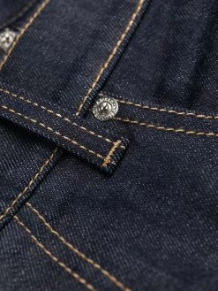 Alexander McQueen studded logo slim-fit jeans