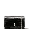 Alexander McQueen skull-embellished clutch bag