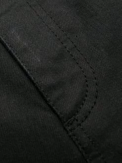 Best deal ✨ Alexander McQueen Logo studded slim fit 👖 jeans 🛒 12 Alexander McQueen logo-studded slim-fit jeans