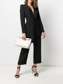 Alexander McQueen Story knuckleduster clutch bag