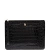 Alexander McQueen skull charm leather clutch bag