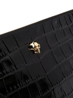 Alexander McQueen skull charm leather clutch bag