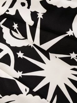 Alexander McQueen all-over print slim-fit trousers