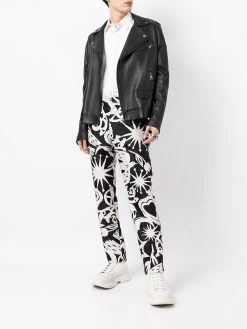 Alexander McQueen all-over print slim-fit trousers
