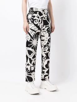 Alexander McQueen all-over print slim-fit trousers