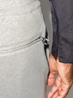 Alexander McQueen graffiti-print track pants