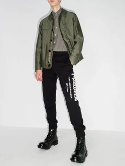 Alexander McQueen logo graffiti print track pants