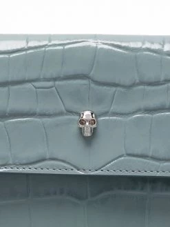 Alexander McQueen skull detail embossed clutch bag