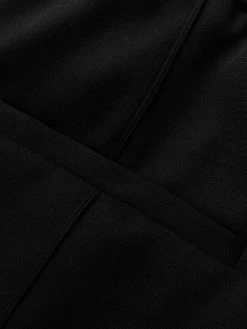 Alexander McQueen elasticated-ankle tailored trousers