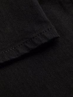 Alexander McQueen logo-patch slim-cut trousers