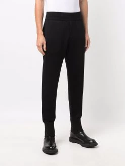 Alexander McQueen tapered logo-patch track pants