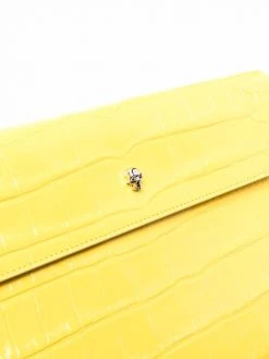 Alexander McQueen skull-embellished leather clutch bag