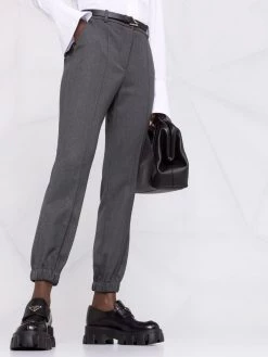 Alexander McQueen pressed-crease trousers