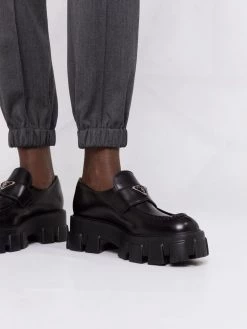 Alexander McQueen pressed-crease trousers