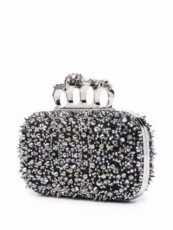 Alexander McQueen four-ring skull studded clutch