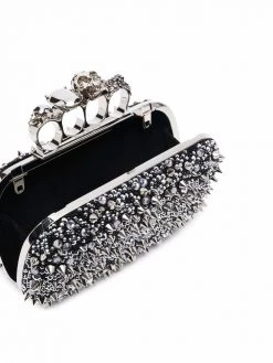 Alexander McQueen four-ring skull studded clutch