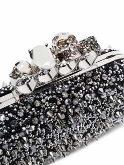 Alexander McQueen four-ring skull studded clutch