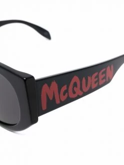 Alexander McQueen Graffiti logo-print oval-frame sunglasses