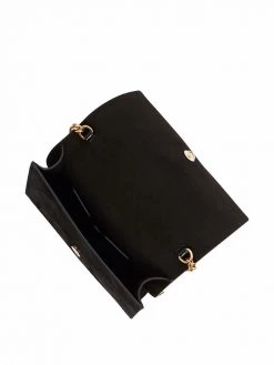 Alexander McQueen skull charm mini bag